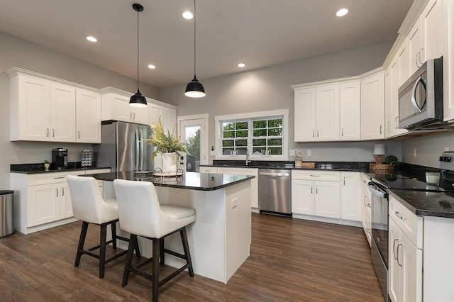 2460 S Durango Dr, Bolivar, MO 65613 - kitchen featuring white cabinetry, recessed lighting, and appliances with stainless steel finishes