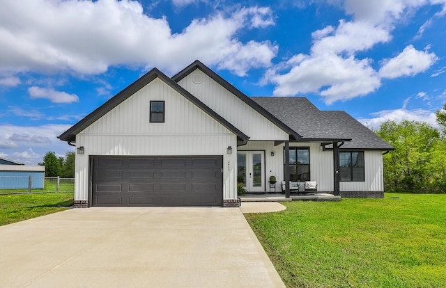 2460 S Durango Dr, Bolivar, MO 65613 - modern farmhouse style home featuring fence, a shingled roof, driveway, french doors, and a front yard