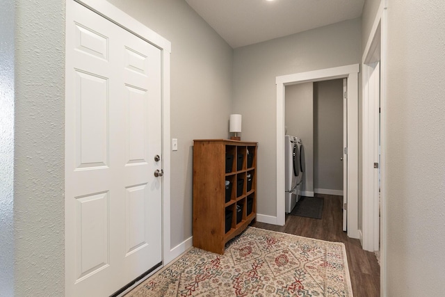 2460 S Durango Dr, Bolivar, MO 65613 - interior space featuring baseboards, wood finished floors, and washing machine and clothes dryer