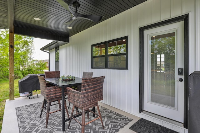 2460 S Durango Dr, Bolivar, MO 65613 - view of patio / terrace with outdoor dining space and ceiling fan
