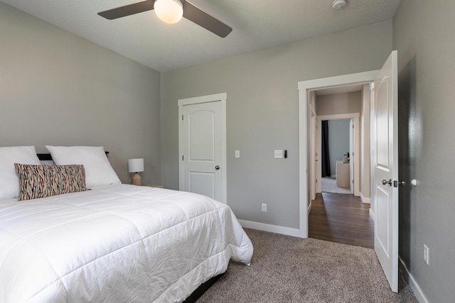 2460 S Durango Dr, Bolivar, MO 65613 - carpeted bedroom featuring baseboards and ceiling fan