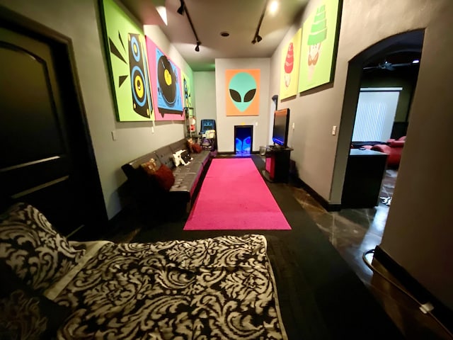 48 King Cir, Branson, MO 65616 - playroom with track lighting, ceiling fan, and baseboards