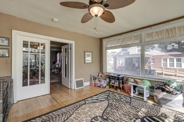 110 N Connor Ave, Joplin, MO 64801 - interior space with visible vents, wood finished floors, and ceiling fan