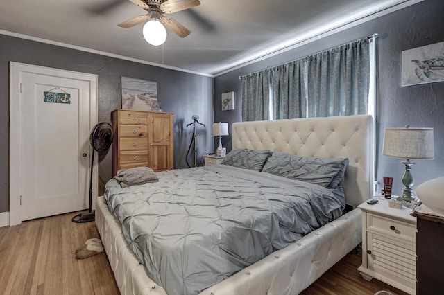 110 N Connor Ave, Joplin, MO 64801 - bedroom with a textured wall, wood finished floors, ceiling fan, and ornamental molding