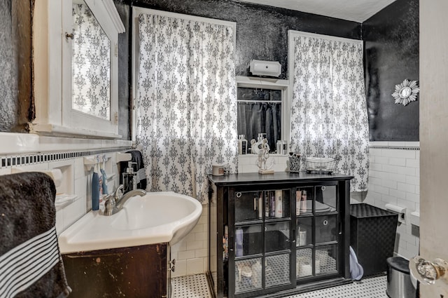 110 N Connor Ave, Joplin, MO 64801 - bathroom featuring tile walls and vanity