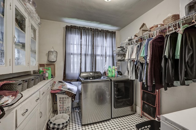 110 N Connor Ave, Joplin, MO 64801 - clothes washing area featuring separate washer and dryer and cabinet space