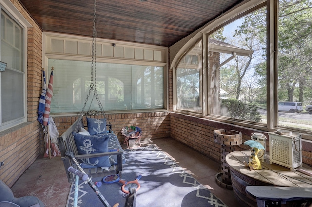 110 N Connor Ave, Joplin, MO 64801 - sunroom / solarium featuring brick wall and wooden ceiling