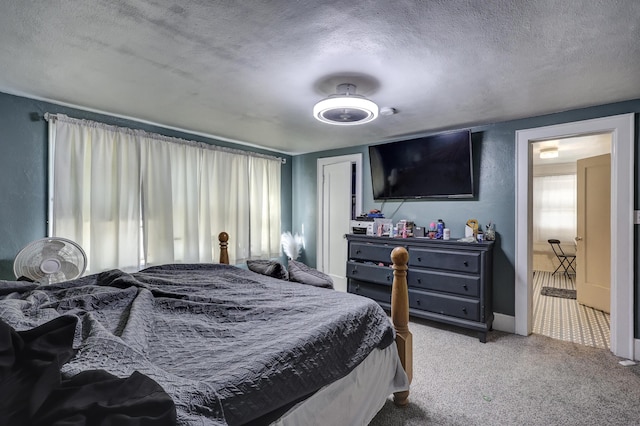 110 N Connor Ave, Joplin, MO 64801 - bedroom with a textured ceiling and carpet flooring