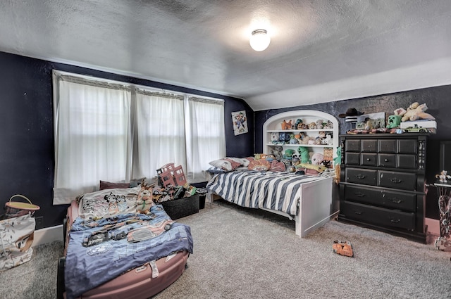 110 N Connor Ave, Joplin, MO 64801 - bedroom with a textured ceiling, lofted ceiling, and carpet flooring