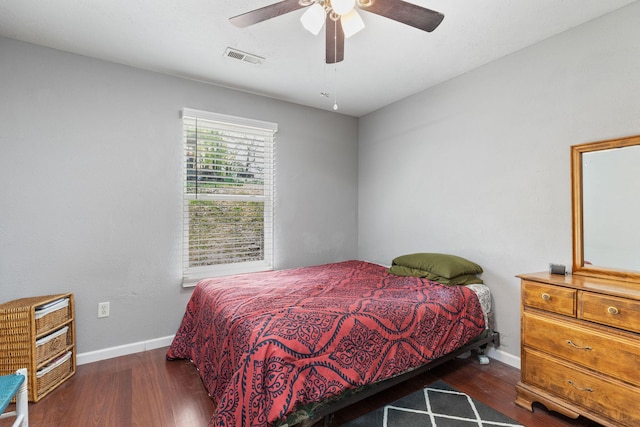 317 Hickory St, Merriam Woods, MO 65740 - bedroom featuring baseboards, visible vents, wood finished floors, and a ceiling fan