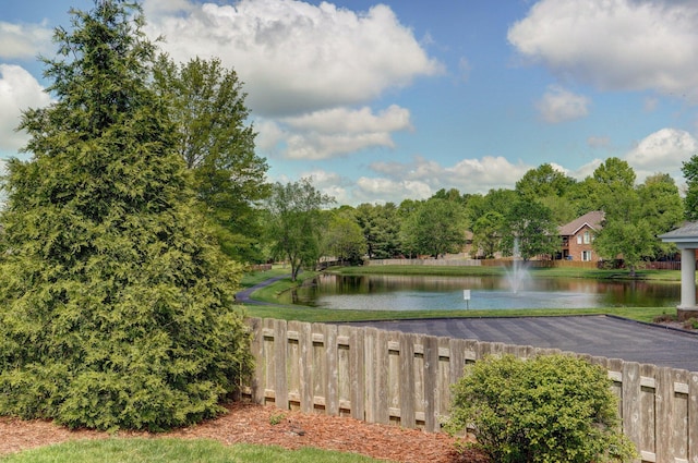 view of water feature featuring fence
