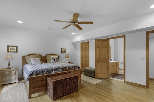 bedroom featuring visible vents, light wood-type flooring, and recessed lighting