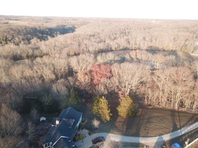 aerial view featuring a forest view