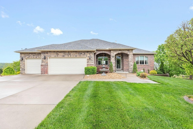 single story home featuring a front lawn, driveway, a garage, and brick siding