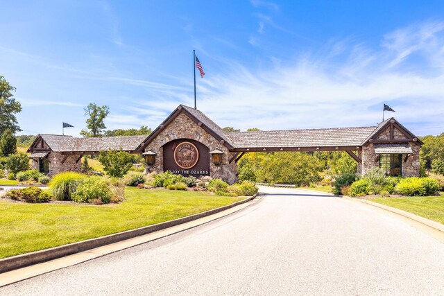 view of building exterior with driveway