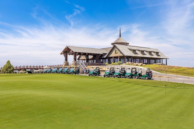 surrounding community featuring a gazebo and golf course view
