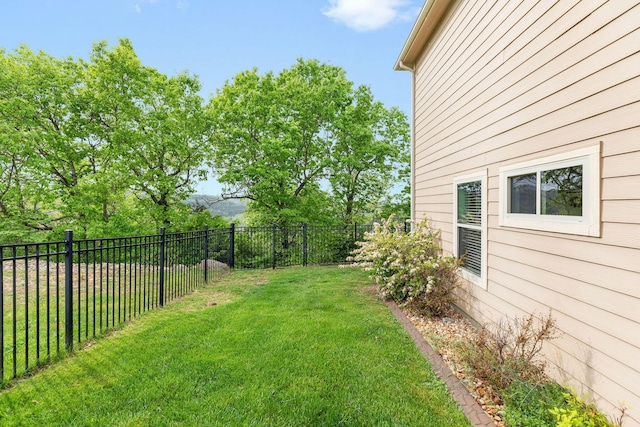 view of yard with a fenced backyard