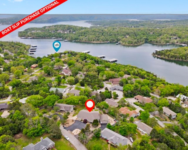 birds eye view of property with a residential view and a water view