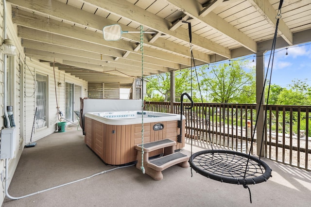 view of patio with a hot tub
