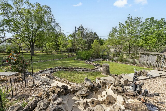 view of yard with fence
