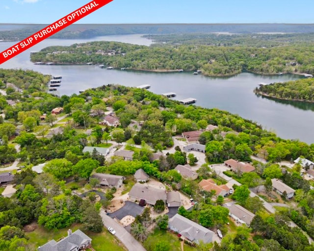 birds eye view of property with a residential view and a water view