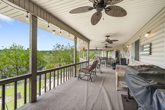 view of patio featuring ceiling fan and outdoor dining area