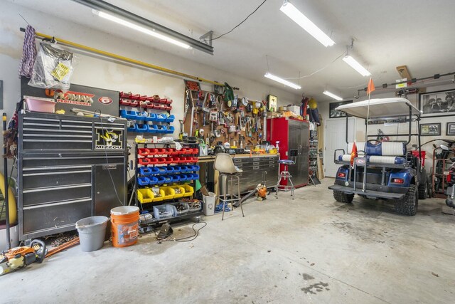 garage with a workshop area