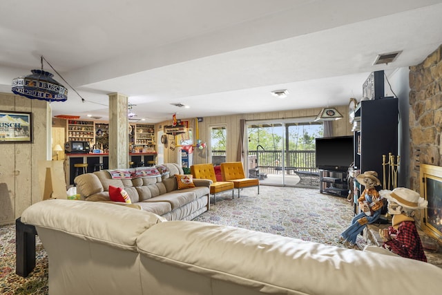 living area featuring visible vents