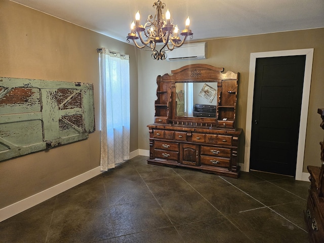 interior space featuring baseboards, a wall mounted air conditioner, and a notable chandelier
