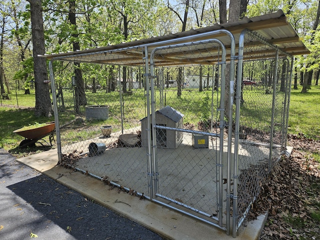 exterior space featuring a gate