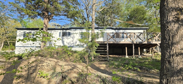 22684 Forest Ln, Hermitage, MO 65668 - rear view of property featuring a wooden deck and stairs