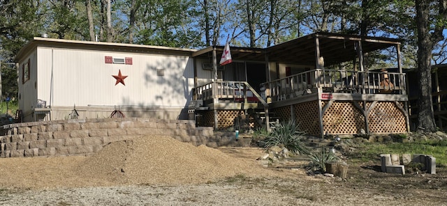 25965 Willow Rd, Hermitage, MO 65668 - view of side of home with a wooden deck