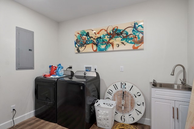 9247 State Highway 13, Kimberling City, MO 65686 - washroom featuring baseboards, electric panel, a sink, cabinet space, and independent washer and dryer
