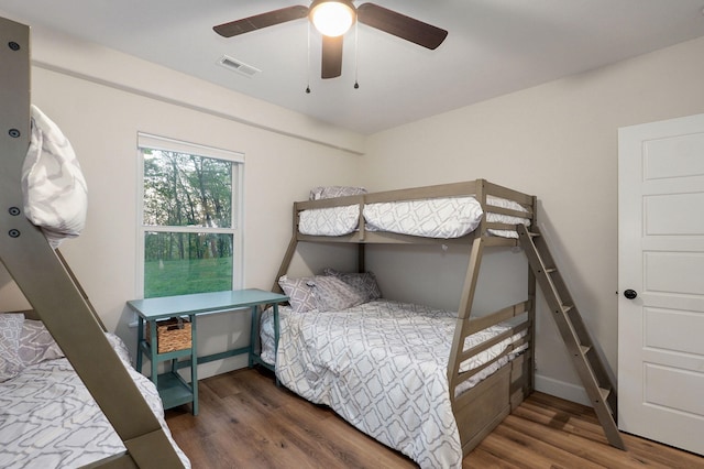 9247 State Highway 13, Kimberling City, MO 65686 - bedroom with a ceiling fan, wood finished floors, and visible vents