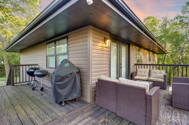 9247 State Highway 13, Kimberling City, MO 65686 - deck at dusk featuring an outdoor hangout area and a grill