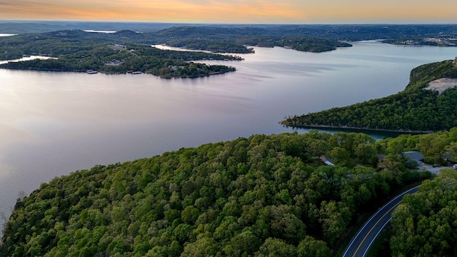 9247 State Highway 13, Kimberling City, MO 65686 - aerial view at dusk featuring a water view and a forest view