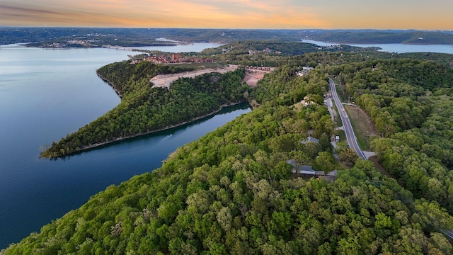 9247 State Highway 13, Kimberling City, MO 65686 - aerial view at dusk featuring a water view and a wooded view