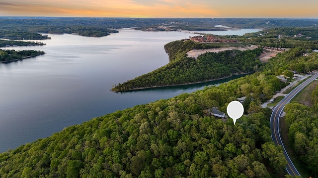 9247 State Highway 13, Kimberling City, MO 65686 - aerial view at dusk featuring a water view and a forest view