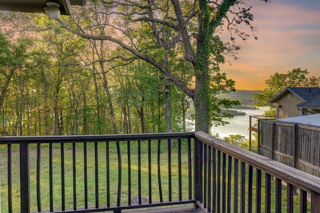 9247 State Highway 13, Kimberling City, MO 65686 - deck at dusk featuring a water view and a yard