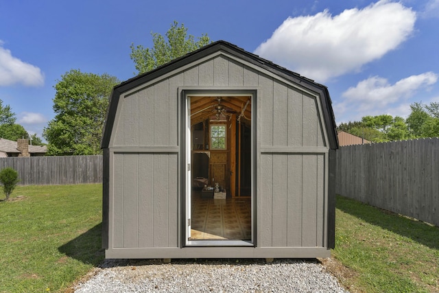view of shed featuring a fenced backyard