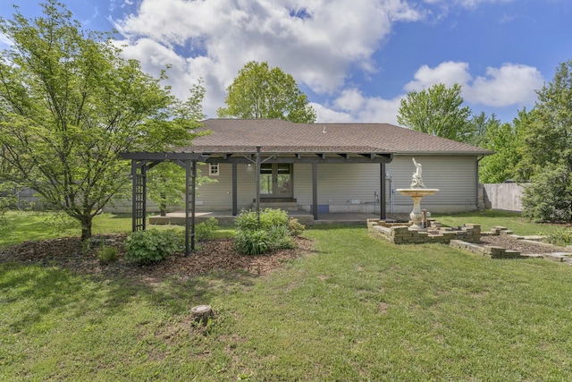 back of house with a lawn, fence, and a patio