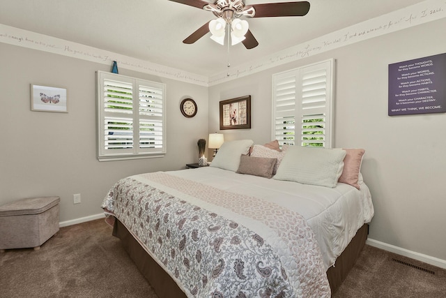 1522 S Oakland Ave, Bolivar, MO 65613 - bedroom with carpet floors, baseboards, and multiple windows