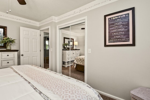 1522 S Oakland Ave, Bolivar, MO 65613 - carpeted bedroom featuring baseboards, a ceiling fan, and a closet