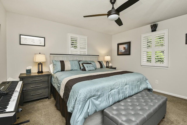 1522 S Oakland Ave, Bolivar, MO 65613 - bedroom with baseboards, a ceiling fan, and carpet