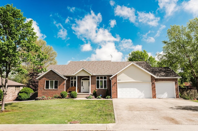 ranch-style home featuring brick siding, driveway, a front lawn, and a garage