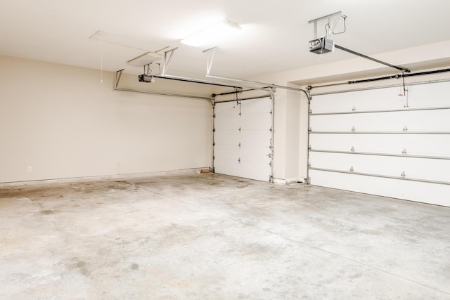 406 S Cedarbrook Dr, Monett, MO 65708 - garage featuring a garage door opener
