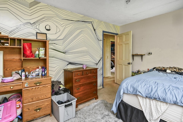 bedroom with light carpet, wallpapered walls, and a textured ceiling