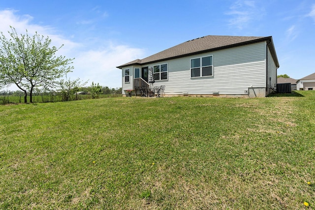 1418 S Lorraine Ave, Republic, MO 65738 - back of house featuring a lawn and central AC unit