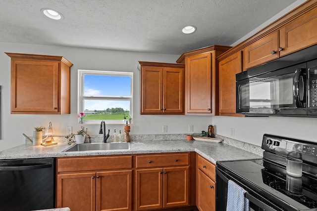 1418 S Lorraine Ave, Republic, MO 65738 - kitchen with a sink, brown cabinets, black appliances, and light countertops