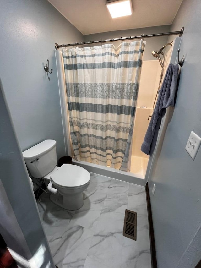 full bath featuring visible vents, marble finish floor, toilet, and a shower stall